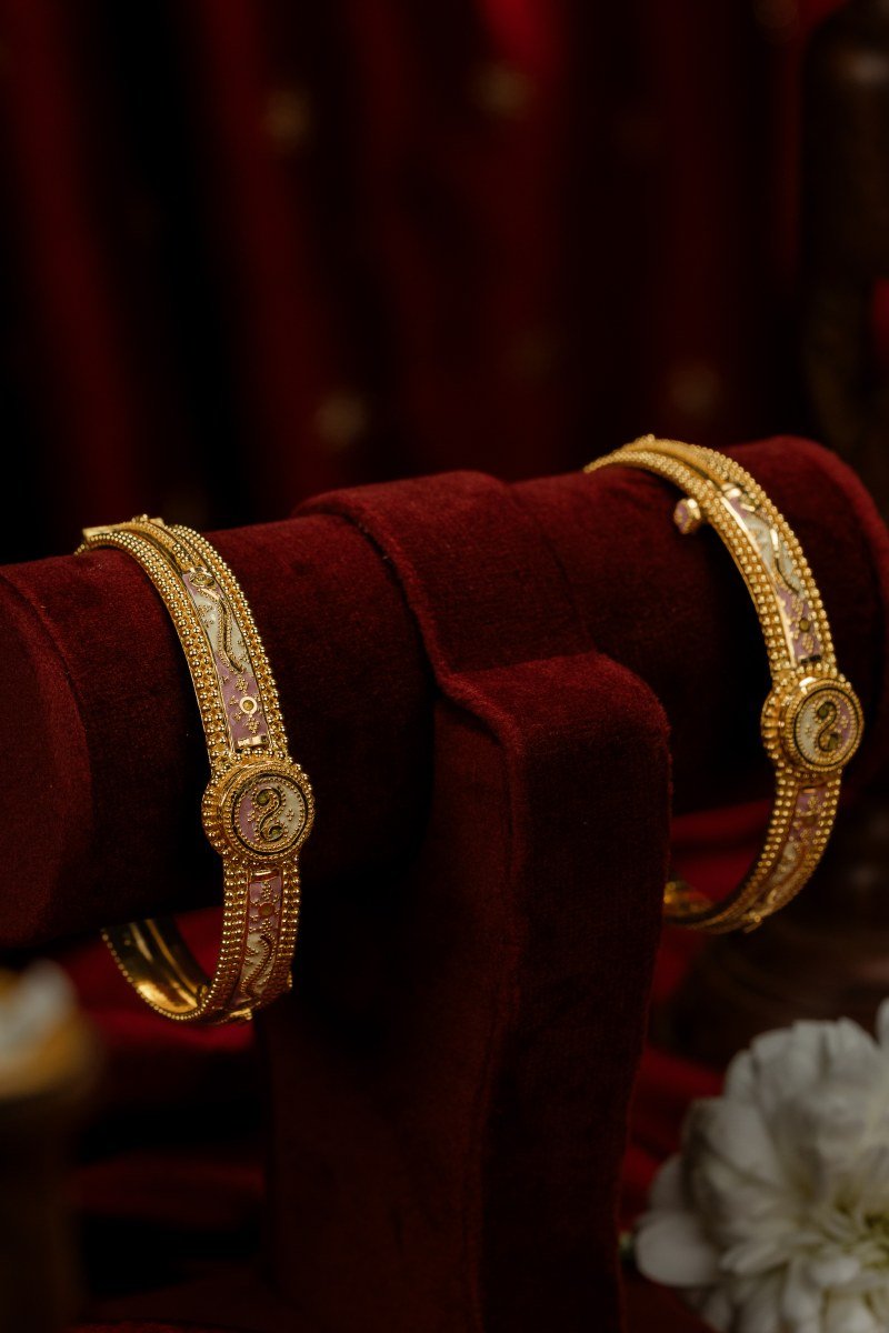 Pair of 22K Gold Filigree Bridal Kadas with delicate pink and white Meenakari enamel at A P Jewellers Prantij